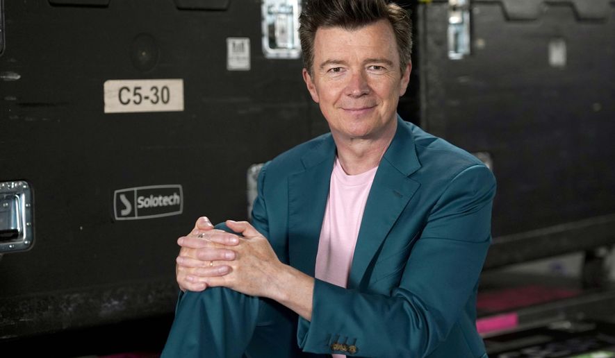 British singer-songwriter Rick Astley poses for a portrait before a concert at the Allstate Arena in Rosemont, Ill., on June 17, 2022. Astley has joined New Kids on the Block, Salt-N-Pepa, and En Vogue for the 57-date &amp;quot;Mixtape 2022&amp;quot; U.S. arena tour this summer. (AP Photo/Charles Rex Arbogast)