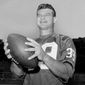 New York Giants halfback Hugh McElhenny, poses at the team&#39;s NFL football training camp in Fairfield, Conn., on Sept. 3, 1963. McElhenny, an elusive NFL running back nicknamed “The King,” died on June 17, 2022, at his home in Nevada, his son-in-law Chris Permann confirmed Thursday, June 23, 2022. He was 93. (AP Photo/Harry Harris, File)