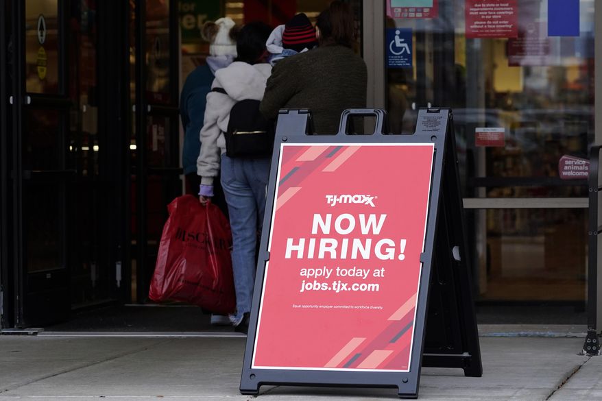 A hiring sign is displayed outside of a retail store in Vernon Hills, Ill., on Nov. 13, 2021. (AP Photo/Nam Y. Huh, File)
