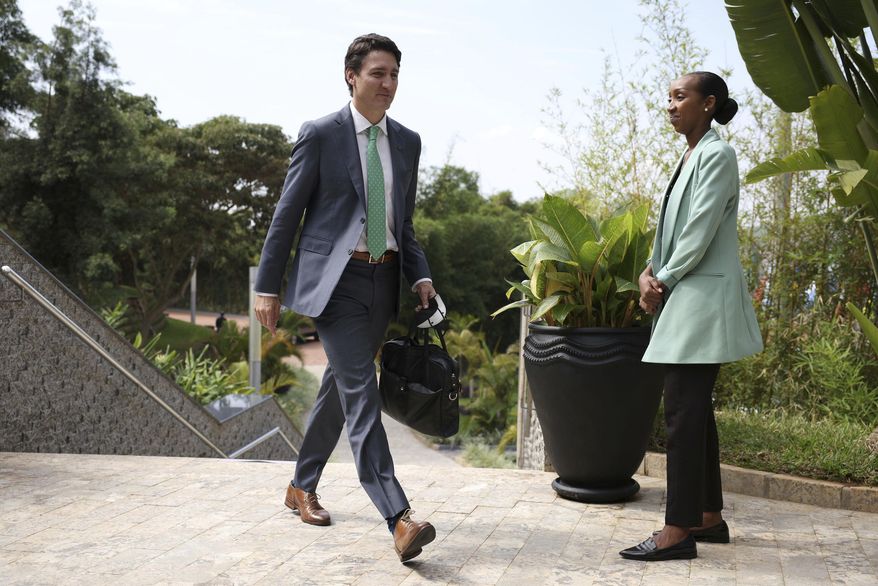 Canada&#39;s Prime Minister Justin Trudeau arrives for the Leaders&#39; Retreat on the sidelines of the Commonwealth Heads of Government Meeting at Intare Conference Arena in Kigali, Rwanda, Saturday, June 25, 2022. (Dan Kitwood/Pool Photo via AP)