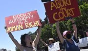 Activists march through downtown Los Angeles, Saturday, June 25, 2022, as they protest the Supreme Court&#39;s ruling on abortion. (Keith Birmingham/The Orange County Register via AP)