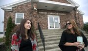 Bangor Christian Schools sophomore Olivia Carson, 15, of Glenburn, Maine, left, stands with her mother Amy while getting dropped off on the first day of school on August 28, 2018 in Bangor, Maine. The Carsons were one of three Maine families that challenged the prohibition on using public money to pay tuition at religious schools. The Supreme Court ruled that Maine can&#39;t exclude religious schools from a program that offers tuition aid for private education in towns that don&#39;t have public schools. (Gabor Degre/The Bangor Daily News via AP, File)