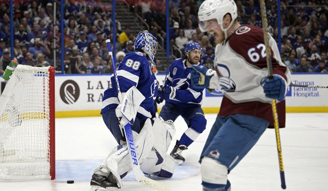 Colorado Avalanche left wing Artturi Lehkonen (62) reacts after scoring on Tampa Bay Lightning goaltender Andrei Vasilevskiy (88) during the second period of Game 6 of the NHL hockey Stanley Cup Finals on Sunday, June 26, 2022, in Tampa, Fla. (AP Photo/Phelan Ebenhack)
