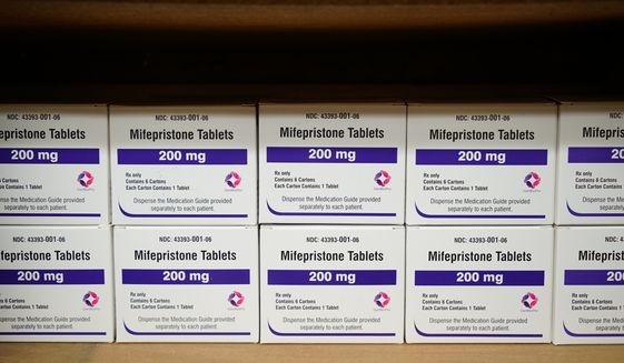 Boxes of the drug mifepristone line a shelf at the West Alabama Women&#39;s Center in Tuscaloosa, Ala., on Wednesday, March 16, 2022. Facebook and Instagram have begun promptly removing posts that offer abortion pills to women who may not be able to access them following a Supreme Court decision that stripped away constitutional protections for the procedure. (AP Photo/Allen G. Breed, File)