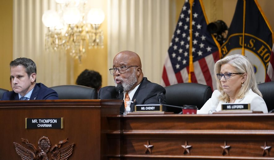 Chairman Bennie Thompson, D-Miss., center, speaks as the House select committee investigating the Jan. 6 attack on the U.S. Capitol continues to reveal its findings of a year-long investigation, at the Capitol in Washington, Thursday, June 23, 2022. Rep. Adam Kinzinger, R-Ill., left, and Vice Chair Liz Cheney, R-Wyo., right, listen. (AP Photo/J. Scott Applewhite)