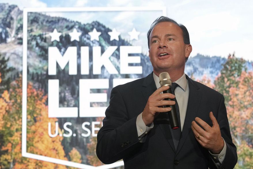 U.S. Sen. Mike Lee, of Utah, talks to supporters during a Utah Republican election night party, Tuesday, June 28, 2022, in South Jordan, Utah. (AP Photo/George Frey)