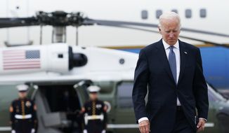 U.S. President Joe Biden walks on the tarmac next to Air Force One at Munich International Airport in Munich, Germany, Tuesday, June 28, 2022. Biden is departing Germany after having attended the Group of Seven summit and is on his way to Spain to attend a NATO summit. (AP Photo/Susan Walsh)