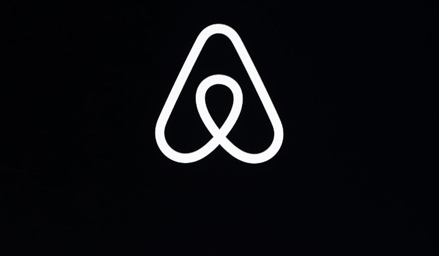 This Feb. 22, 2018, file photo, shows an Airbnb logo during an event in San Francisco. Airbnb says it’s making its party ban permanent. The short-term-rental company said Tuesday, June 28, 2022 that the temporary ban it put into effect in 2020 is working, so it decided to make it permanent. (AP Photo/Eric Risberg, File)
