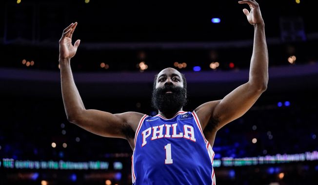 Philadelphia 76ers&#x27; James Harden gestures during the first half of Game 3 of the team&#x27;s NBA basketball second-round playoff series against the Miami Heat, May 6, 2022, in Philadelphia. A person familiar with the situation said Harden chose not to exercise his $47.4 million option for next season and will become a free agent — but with no designs on leaving Philadelphia. Harden made the decision to allow the 76ers the flexibility they need to sign other players this summer, said the person who spoke to The Associated Press on condition of anonymity because neither side confirmed those plans publicly. (AP Photo/Matt Slocum, File) **FILE**