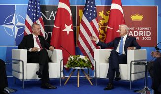 President Joe Biden meets with Turkey&#39;s President Recep Tayyip Erdogan during the NATO summit in Madrid, Wednesday, June 29, 2022. (AP Photo/Susan Walsh)