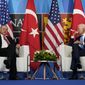 President Joe Biden, right, meets with Turkey&#x27;s President Recep Tayyip Erdogan, left, during the NATO summit in Madrid, Wednesday, June 29, 2022. (AP Photo/Susan Walsh)