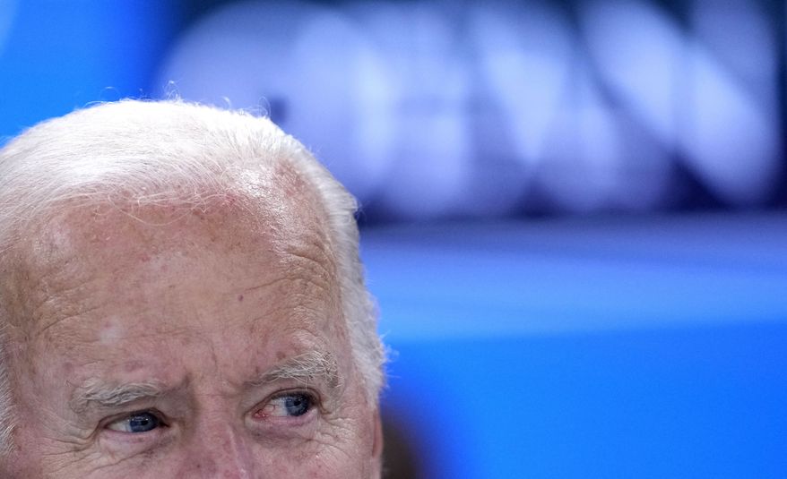 U.S. President Joe Biden arrives for a round table meeting at a NATO summit in Madrid, Spain on Wednesday, June 29, 2022. North Atlantic Treaty Organization heads of state meet for a NATO summit in Madrid from Tuesday through Thursday. (AP Photo/Bernat Armangue)