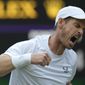 Britain&#39;s Andy Murray celebrates winning the third set during the singles tennis match against John Isner of the US on day three of the Wimbledon tennis championships in London, Wednesday, June 29, 2022. (AP Photo/Alastair Grant)