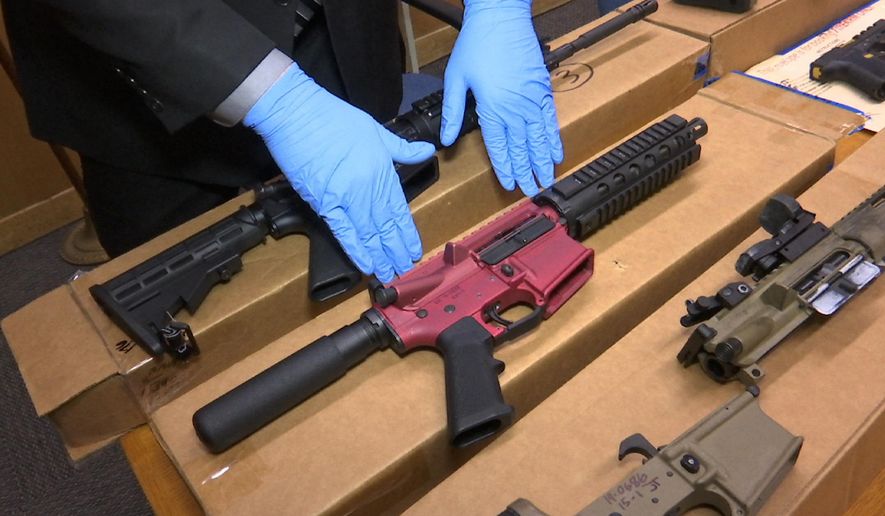 In this Nov. 27, 2019, file photo, &quot;ghost guns&quot; are displayed at the headquarters of the San Francisco Police Department in San Francisco. (AP Photo/Haven Daley, File)