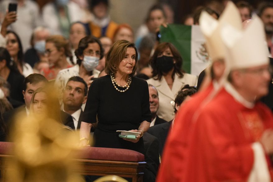 Speaker of the House Nancy Pelosi, D-Calif., looks at Pope Francis as he celebrates a Mass on the Solemnity of St. Peter and St. Paul, in St. Peter&#39;s Basilica at the Vatican, Wednesday, June 29, 2022. (AP Photo/Alessandra Tarantino)