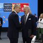 U.S. President Joe Biden and NATO Secretary General Jens Stoltenberg, right, talk during the Meeting of the North Atlantic Council Session with fellow heads of state at the NATO summit at the IFEMA arena in Madrid, Thursday, June 30, 2022. (Jonathan Ernst/Pool Photo via AP)