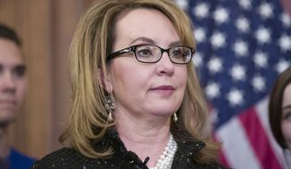 Former Rep. Gabby Giffords, stands during a news conference on Capitol Hill, Jan. 8, 2019 in Washington. (AP Photo/Alex Brandon, File)
