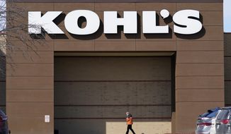 In this Feb. 25, 2021, file photo, a woman arrives at a Kohl&#39;s store in West Des Moines, Iowa. Kohl&#39;s board has nixed a deal to be bought by Franchise Group, Friday, July 1, 2022, citing a poor retail environment caused by rising inflation that has consumers pulling back on spending. (AP Photo/Charlie Neibergall, File)