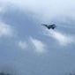 In this image taken from video, a fighter jet flies overhead and visible from Tak province, Thailand on Thursday, June 30, 2022. A Myanmar fighter jet crossed the border into Thailand&#x27;s airspace, prompting Thai air force jets to scramble and officials to order the evacuation of villages and classrooms, officials said. (AP Photo/Chiravut Rungjumrusrussamee)
