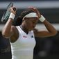 Coco Gauff of the US is dejected after losing a point to Amanda Anisimova of the US in a third round women&#x27;s singles match on day six of the Wimbledon tennis championships in London, Saturday, July 2, 2022. (AP Photo/Alastair Grant)