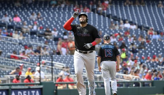 Miami Marlins&#39; Jesus Aguilar celebrates his two-run home run during the first inning of a baseball game against the Washington Nationals, Saturday, July 2, 2022, in Washington. (AP Photo/Nick Wass)