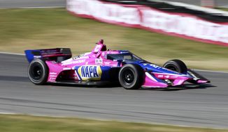 Alexander Rossi races during an IndyCar auto race at Mid-Ohio Sports Car Course in Lexington, Ohio, Sunday, July 3, 2022. (AP Photo/Tom E. Puskar) **FILE**