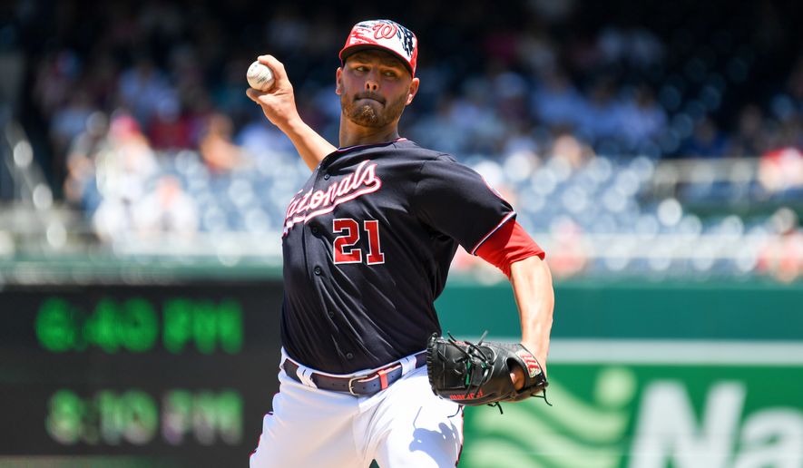 Washington Nationals relief pitcher Tanner Rainey (21) throwing a pitch during the 10th inning in a game against the Miami Marlins at Nationals Park in Washington D.C., July 4, 2022. (Photo by All-Pro Reels)