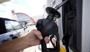 A motorist fills up a vehicle at a Shell gas station Monday, July 4, 2022, in Commerce City, Colo. (AP Photo/David Zalubowski)