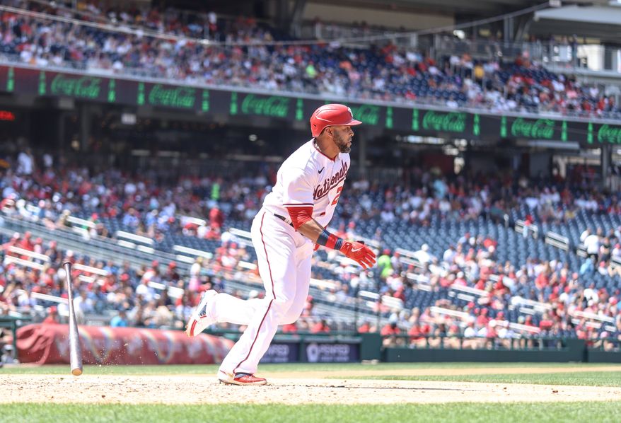 Designated Hitter Nelson Cruz (23) tosses his bat as he transitions from batting to running to first at the  Miami Marlins vs Washington Nationals series at Nationals Park in Washington DC on July 3rd 2022 (Photo: All-Pro Reels/Alyssa Howell)