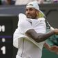 Australia&#39;s Nick Kyrgios returns to Brandon Nakashima of the US in a men&#39;s singles fourth round match on day eight of the Wimbledon tennis championships in London, Monday, July 4, 2022. (AP Photo/Alberto Pezzali) **FILE**