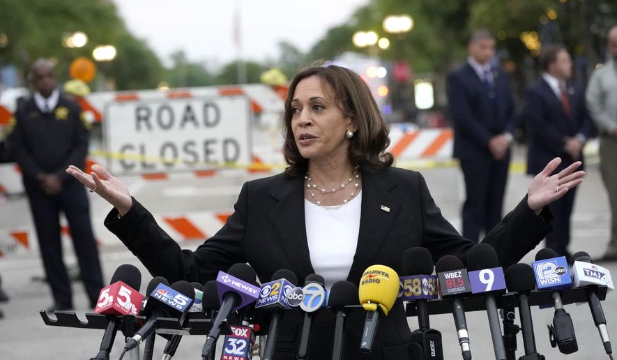 Vice president Kamala Harris speaks to those gathered near the site of Monday&#39;s mass shooting during the Highland Park July 4th parade Tuesday, July 5, 2022, in Highland Park, Ill. (AP Photo/Charles Rex Arbogast)