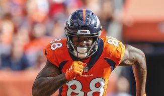 In this Sept. 16, 2018, file photo, Denver Broncos wide receiver Demaryius Thomas (88) runs against the Oakland Raiders during the second half of an NFL football game, in Denver. Former NFL star Demaryius Thomas, who died last December at age 33, had CTE, his family said Tuesday, July 5, 2022.  (AP Photo/Jack Dempsey, File) **FILE**