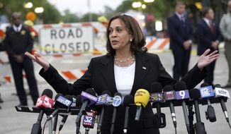 Vice President Kamala Harris speaks to those gathered near the site of Monday&#39;s mass shooting during the Highland Park July 4th parade Tuesday, July 5, 2022, in Highland Park, Ill. (AP Photo/Charles Rex Arbogast)