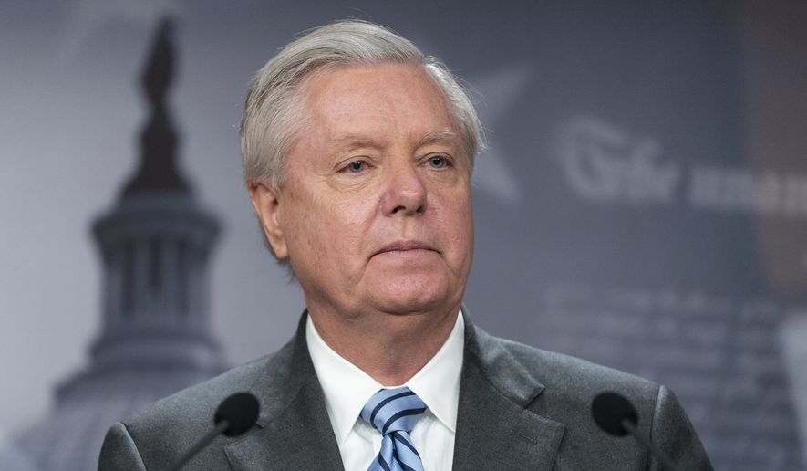 Sen. Lindsey Graham, R-S.C., speaks with reporters about aid to Ukraine, on Capitol Hill, Wednesday, March 10, 2022, in Washington. (AP Photo/Alex Brandon, File)