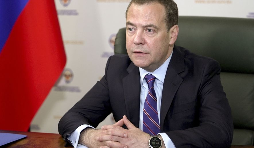 Russian Security Council Deputy Chairman and the head of the United Russia party Dmitry Medvedev speaks during a meeting in St. Petersburg, Russia, Wednesday, July 6, 2022. Medvedev warned the U.S. Wednesday that it could face the &quot;wrath of God&quot; if it pursues efforts to help establish an international tribunal to investigate Russia&#x27;s action in Ukraine. (Yekaterina Shtukina, Sputnik, Pool Photo via AP)