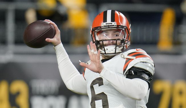 Cleveland Browns quarterback Baker Mayfield (6) warms up before an NFL football game against the Pittsburgh Steelers, on Jan. 3, 2022, in Pittsburgh. Mayfield&#x27;s rocky run with Cleveland officially ended Wednesday, July 6, 2022, with the Browns trading the divisive quarterback and former No. 1 overall draft pick to the Carolina Panthers, a person familiar with the deal told the Associated Press. (AP Photo/Gene J. Puskar, File) **FILE**