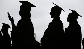 FILE - In this May 17, 2018, file photo, new graduates line up before the start of the Bergen Community College commencement at MetLife Stadium in East Rutherford, N.J.  A deadline is fast approaching for teachers, librarians, nurses and others who work in public service to apply to have their student loan debt forgiven. New figures from the U.S. Department of Education show 145,000 borrowers have had the remainder of their debt canceled through the Public Service Loan Forgiveness program. (AP Photo/Seth Wenig, File)