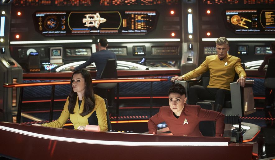 This image released by Paramount+ shows, from left, Rebecca Romijn as Una, Ethan Peck as Spock, background, Melissa Navia as Ortegas and Anson Mount as Pike in a scene from the series &amp;quot;Star Trek: Strange New Worlds.&amp;quot; (Marni Grossman/Paramount+ via AP)
