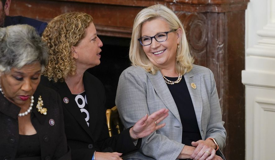 Rep. Liz Cheney, R-Wyo., talks with Rep. Debbie Wasserman Schultz, D-Fla., as they arrive to attend a ceremony to award the nation&#39;s highest civilian honor, the Presidential Medal of Freedom, in the East Room of the White House in Washington, Thursday, July 7, 2022. (AP Photo/Susan Walsh)  **FILE**