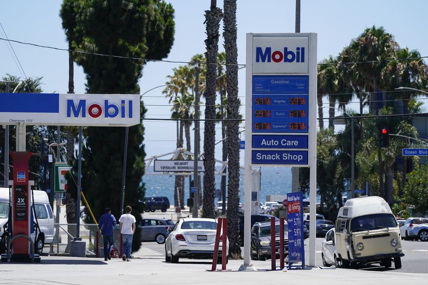 Gas prices are shown at a gas station on Thursday, July 7, 2022, in Long Beach, Calif. (AP Photo/Ashley Landis)