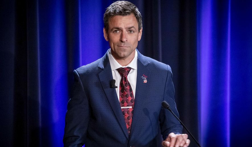 Michigan Republican candidate for governor Ryan Kelley, of Allendale, appears at a debate in Grand Rapids, Mich., Wednesday, July 6, 2022. (Michael Buck/WOOD TV8 via AP)