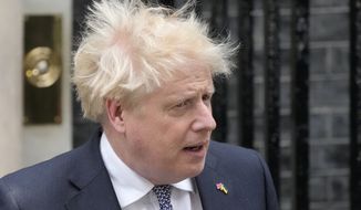 Prime Minister Boris Johnson arrives to read a statement outside 10 Downing Street, formally resigning as Conservative Party leader, in London, Thursday, July 7, 2022. (AP Photo/Frank Augstein) ** FILE **