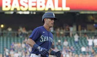 Seattle Mariners&#39; Dylan Moore rounds the bases after hitting a solo home run against the Toronto Blue Jays during the second inning of a baseball game, Thursday, July 7, 2022, in Seattle. (AP Photo/Ted S. Warren)