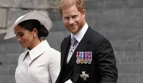 FILE - Prince Harry and his wife Meghan, Duchess of Sussex, depart after attending a service of thanksgiving for the reign of Queen Elizabeth II at St Paul&#39;s Cathedral in London, June 3, 2022. Prince Harry won the first stage of a libel suit against the publisher of Britain’s Mail on Sunday newspaper as a judge ruled Friday, July 8 that parts of a story about his fight for police protection in the U.K. were defamatory. (AP Photo/Alberto Pezzali, file)