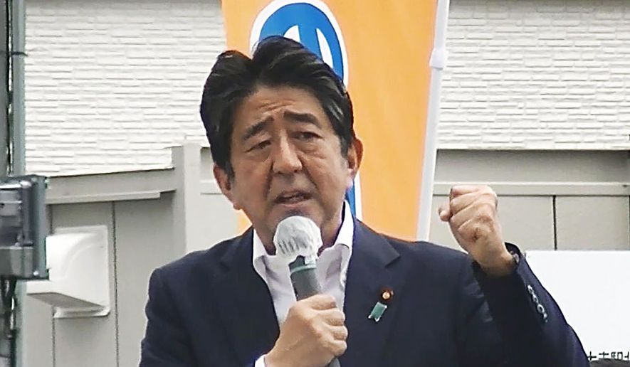 In this image from a video, Japan’s former Prime Minister Shinzo Abe makes a campaign speech in Nara, western Japan shortly before he was shot Friday, July 8, 2022. Abe was shot during the speech and was airlifted to a hospital but he was not breathing and his heart had stopped, officials said. He died of his injuries. (Kyodo News via AP)