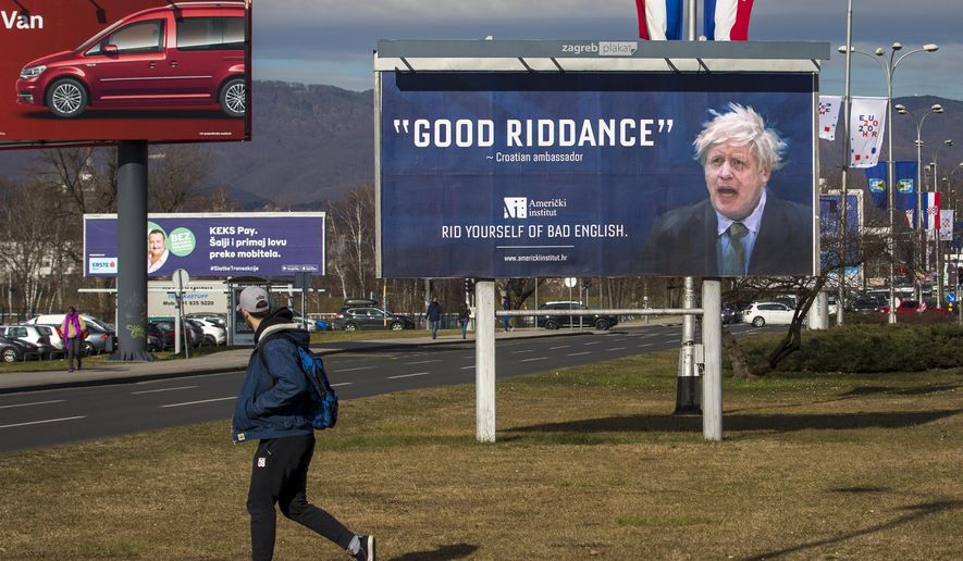 An advertising billboard for an English language school depicts Britain&#39;s prime minister Boris Johnson, in Zagreb, Croatia, Feb. 6, 2020. Outgoing U.K. Prime Minister Boris Johnson has been the bane of Brussels for many years, from his days stoking anti-European Union sentiment with exaggerated newspaper stories to his populist campaign leading Britain out of the bloc and reneging on the post-Brexit trade deal he himself signed. (AP Photo/Darko Bandic, file)