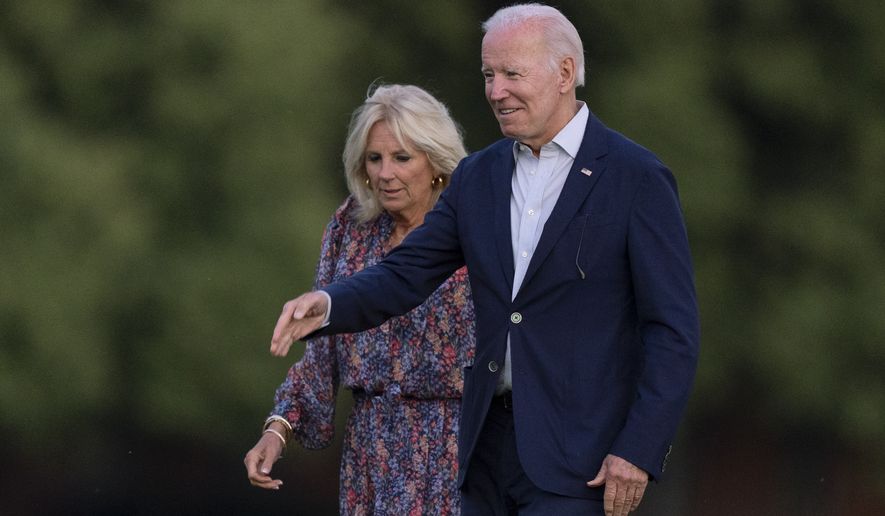 President Joe Biden and first lady Jill Biden arrive at Fort Lesley J. McNair in Washington from a weekend trip to Rehoboth Beach, Del., Sunday, July 10, 2022. (AP Photo/Manuel Balce Ceneta)
