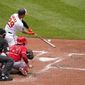 Baltimore Orioles&#39; Ramon Urias (29) connects for a two-run single that drove in Ryan Mountcastle and Anthony Santander during the fourth inning of a baseball game against the Los Angeles Angels, Sunday, July 10, 2022, in Baltimore. (AP Photo/Julio Cortez)