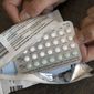 A one-month dosage of hormonal birth control pills is displayed in Sacramento, Calif., Aug. 26, 2016. A drug company is seeking U.S. approval for the first-ever birth control pill that women could buy without a prescription. The request from a French drugmaker sets up a high-stakes decision for the Food and Drug Administration amid the political fallout from the Supreme Court&#39;s recent decision overturning Roe v. Wade. (AP Photo/Rich Pedroncelli, File)