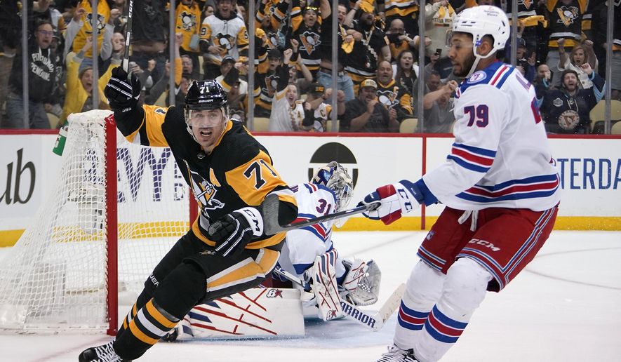Pittsburgh Penguins&#39; Evgeni Malkin (71) celebrates after his goal during the second period in Game 6 of an NHL hockey Stanley Cup first-round playoff series against the New York Rangers in Pittsburgh, May 13, 2022. Malkin has decided to go to free agency rather than re-sign with the Penguins before the start of free agency, a person with knowledge of the move said. The person spoke to the The Associated Press on condition of anonymity because neither Malkin nor the Penguins announced the intent for him to go to market. (AP Photo/Gene J. Puskar, File) **FILE**